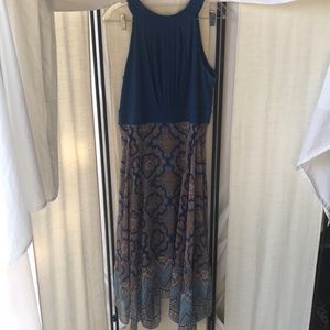 Flattering dress handkerchief hem